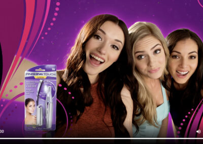 Screenshot from a commercial for Finishing Touch Lumina with three happy young women taking a selfie